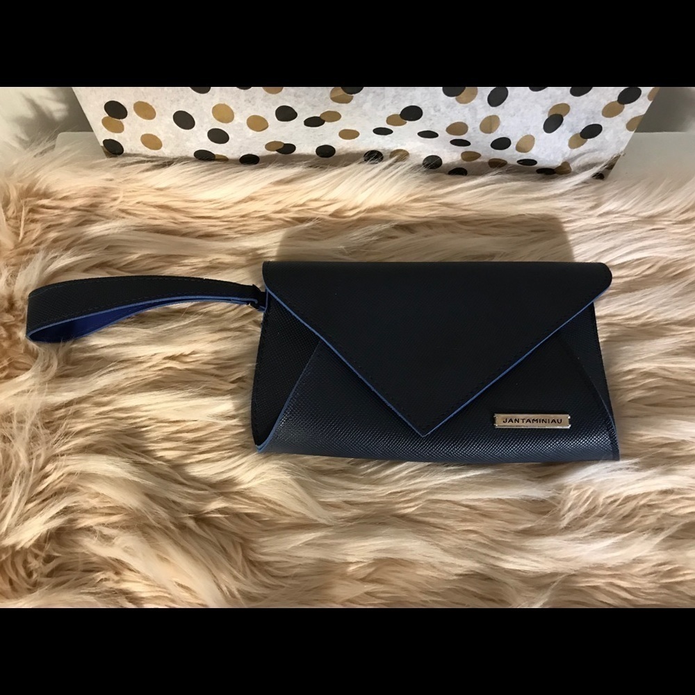 Jantaminiau/ KLM envelope clutch in royal blue.